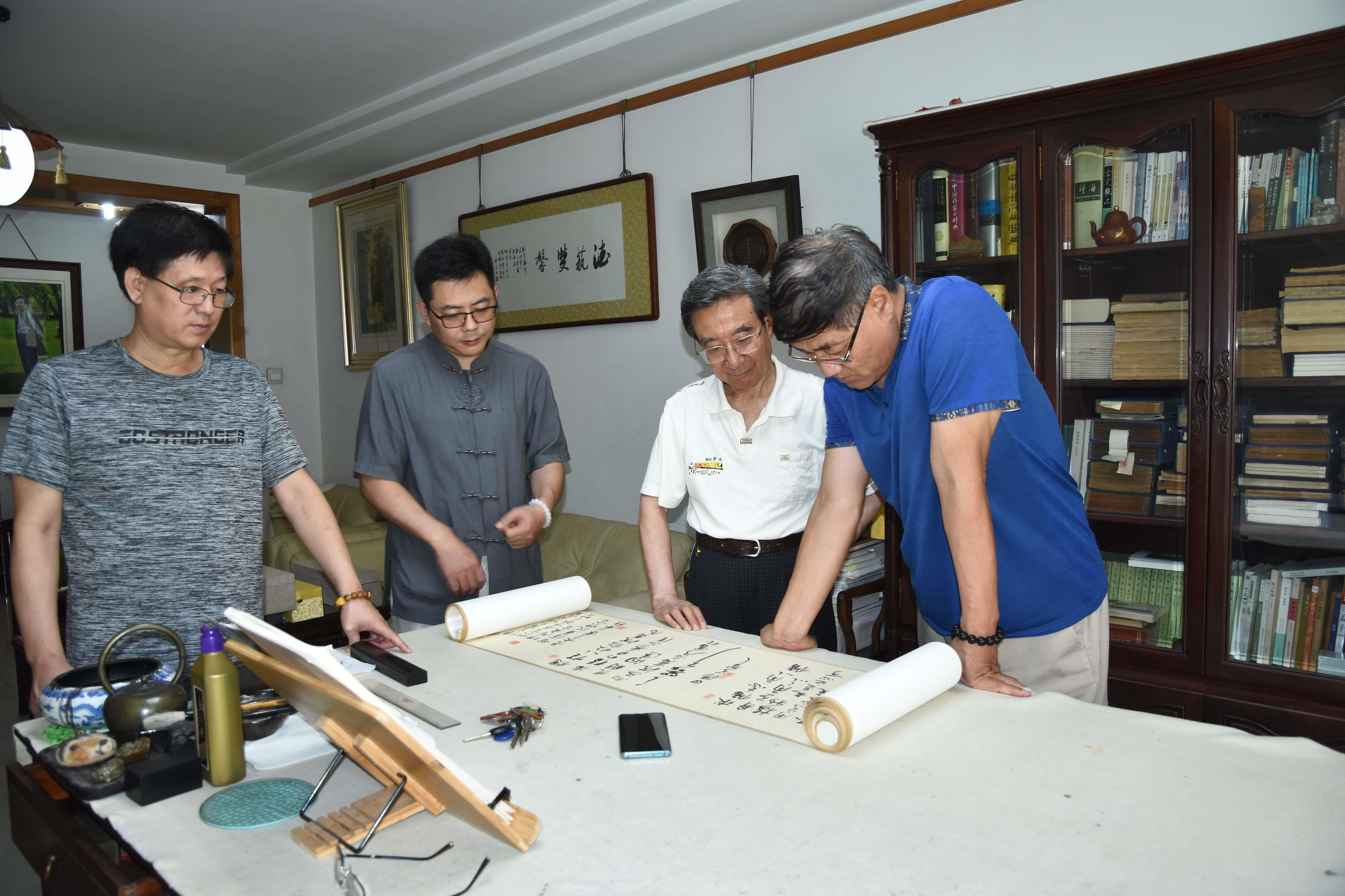 胡立民、付殿川、徐占博欣赏旭宇《评议唐诗》原作，2019.jpg